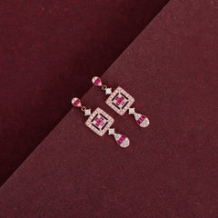 Ruby Radiance: Rose Gold Dangling Earrings with Square Design and Ruby Accents - Shining Silver.in