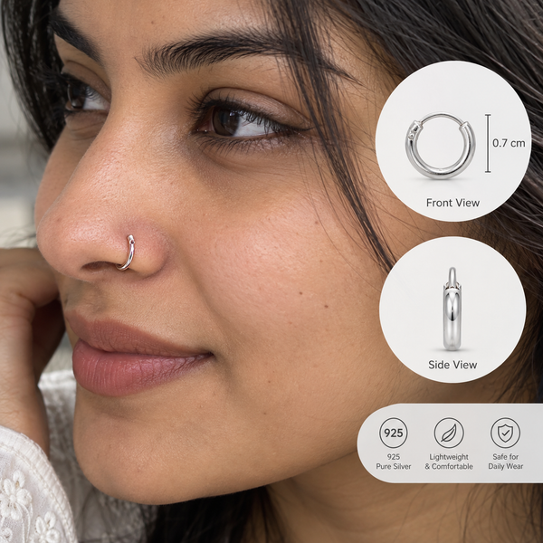 Shiningsilver.in 925 Silver nose bali for women A close-up of a woman wearing a small silver hoop nose ring, with circular inset views showing the front and side of the ring and text noting 0.7 cm size, 925 pure silver, lightweight comfort, and daily wear safety.