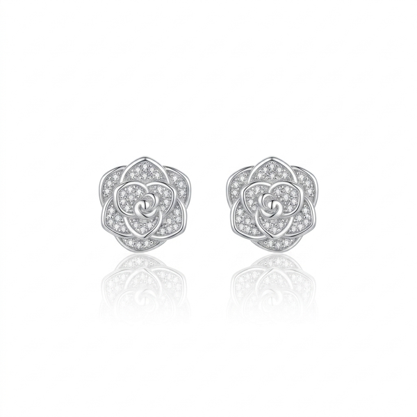 Pair of silver rose-shaped earrings with clear gemstones on a white background