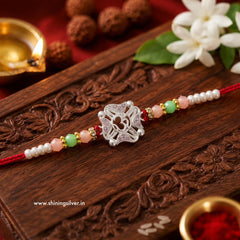SHINING’s Divine OM Silver Rakhi