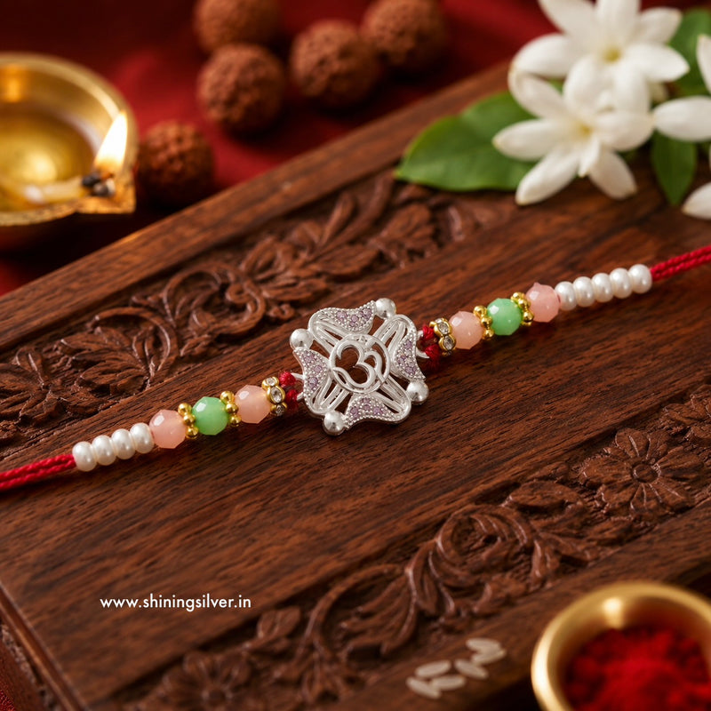 SHINING’s Divine OM Silver Rakhi