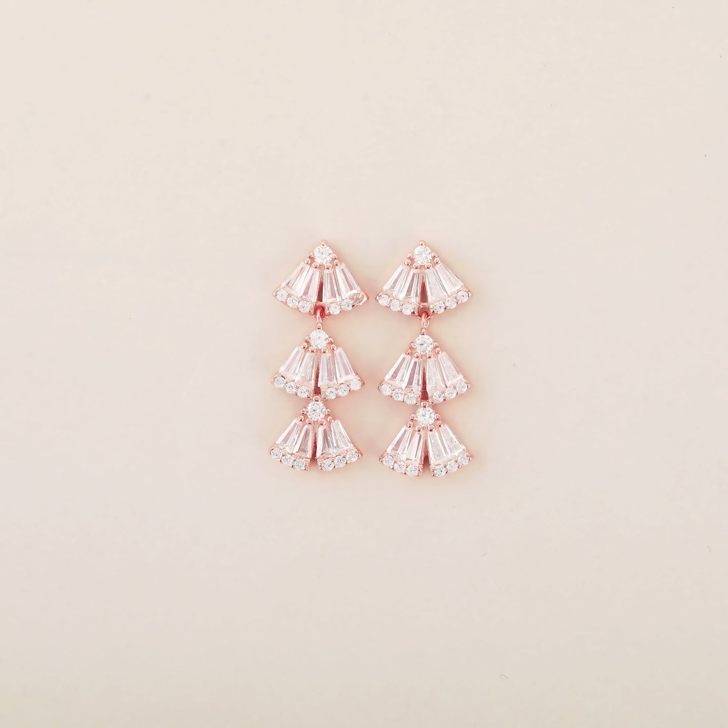 Baguette Brilliance: Rose Gold Earrings with Triangular Sterling Silver Studs Adorned with Baguette CZ Stones - Shining Silver.in