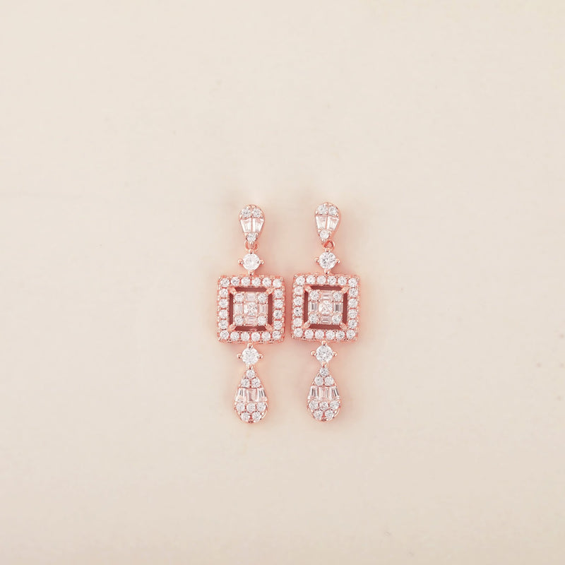 Dazzling Elegance: Rose Gold Dangling Earrings with Square Design and White CZ Accents - Shining Silver.in