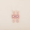 Dazzling Elegance: Rose Gold Dangling Earrings with Square Design and White CZ Accents - Shining Silver.in