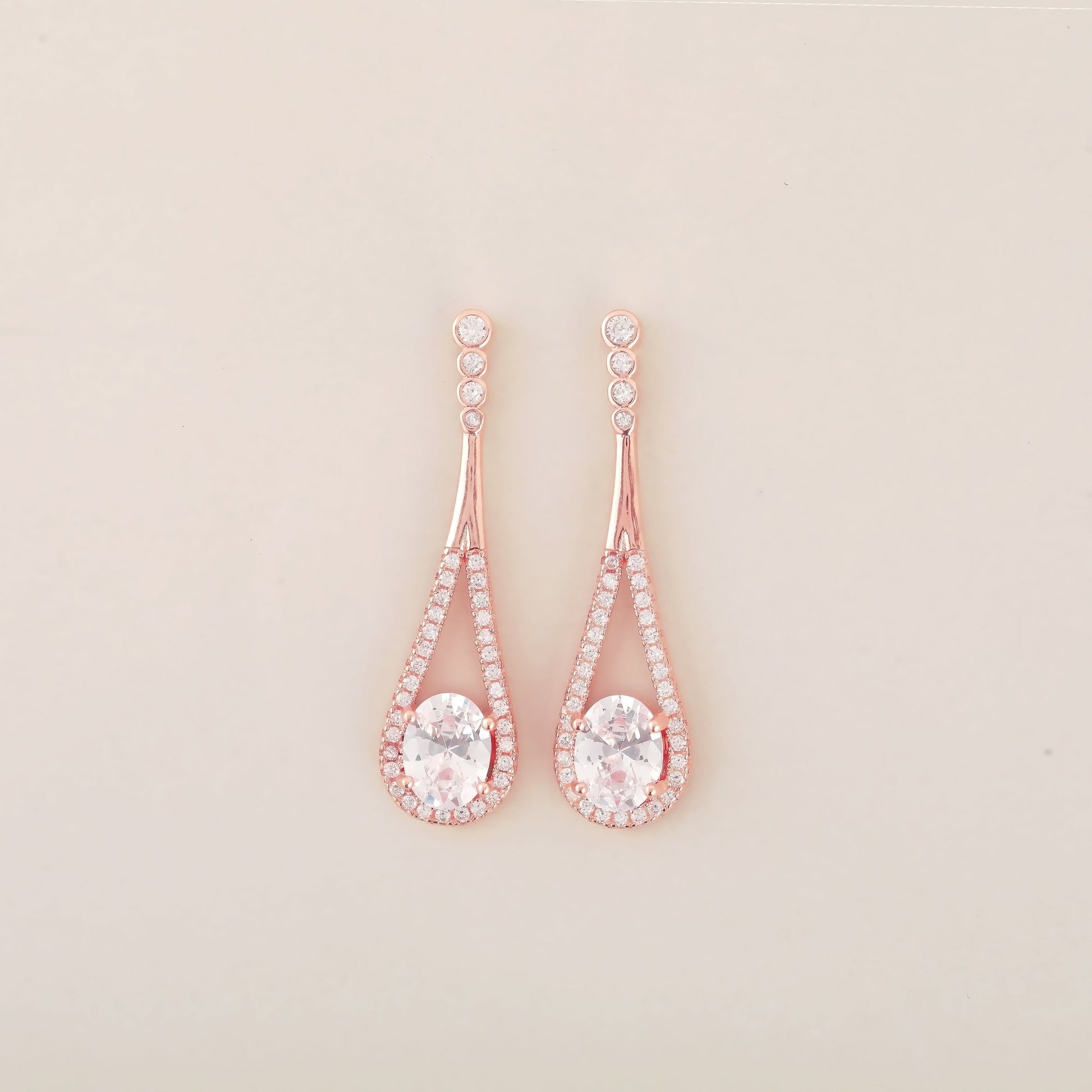 Rosegold Solitare Earrings - Shining Silver.in