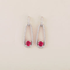 Ruby Radiance Dangle Earrings in Silver - Shining Silver.in