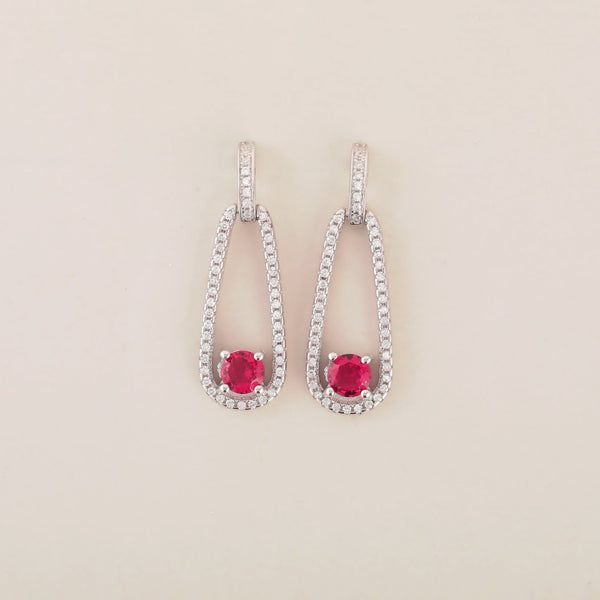 Ruby Radiance Dangle Earrings in Silver - Shining Silver.in